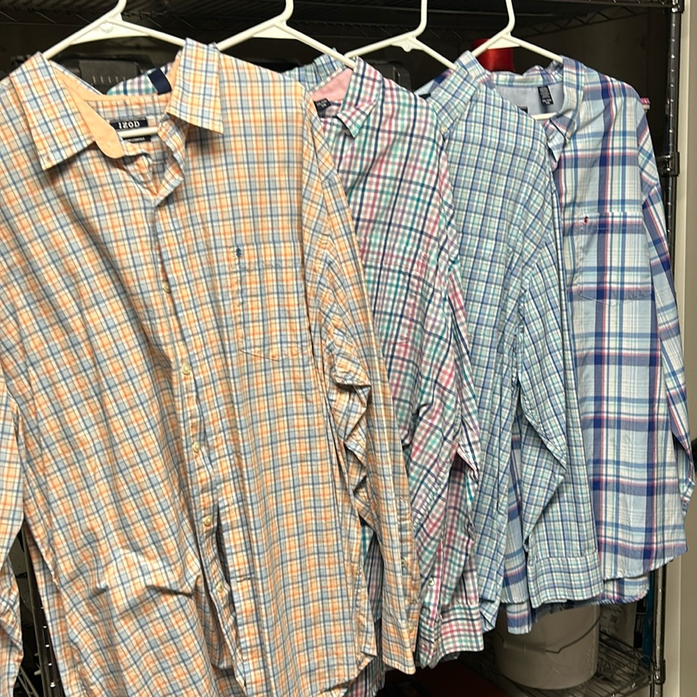 Lot off 4 izod dress shirts.